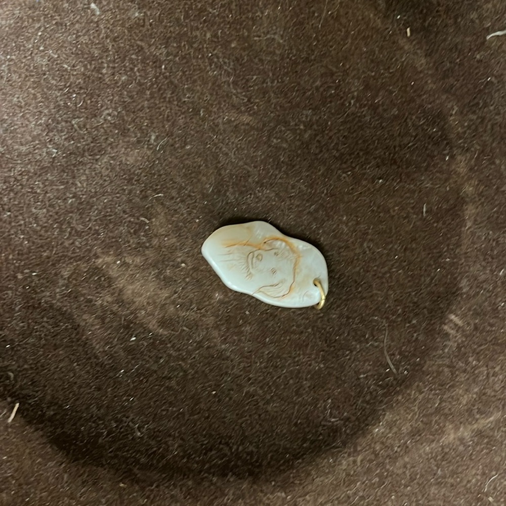 Scrimshaw pendant.   Mother of pearl